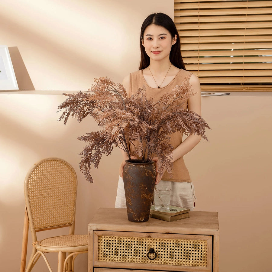 Artificial dried faux fern branches displayed in a tall vase for modern farmhouse decor and shop styling