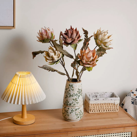 Artificial king protea flower arrangement in ceramic vase for warm home decor styling