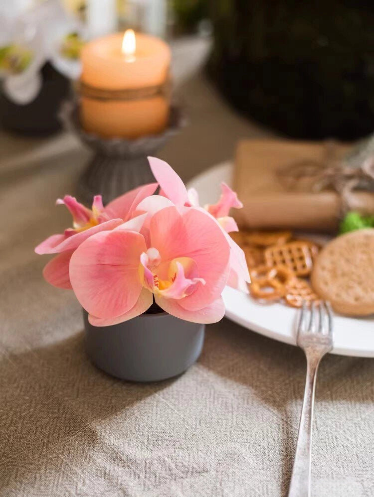 mini artificial orchid pink orchid coffee table decor styling