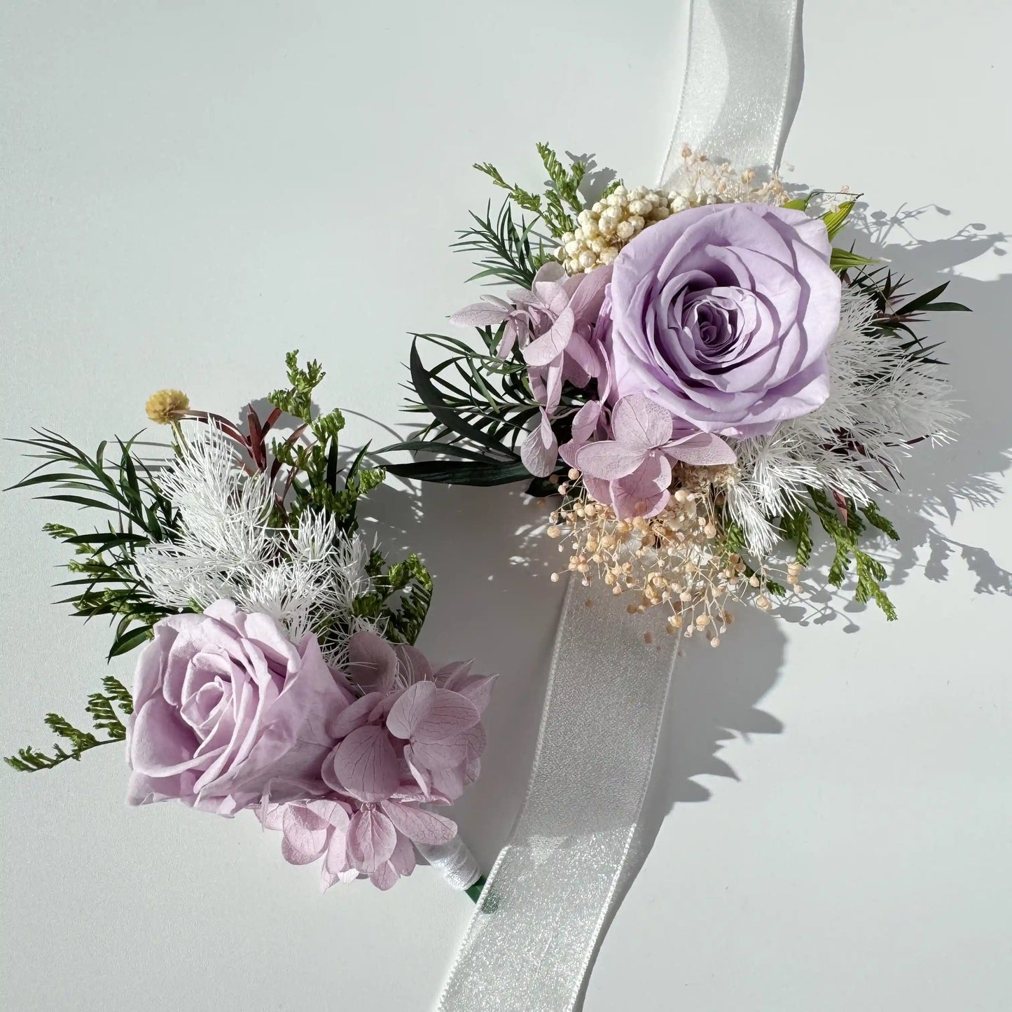 Elegant lavender preserved rose single flower wrist corsage set for bridal party