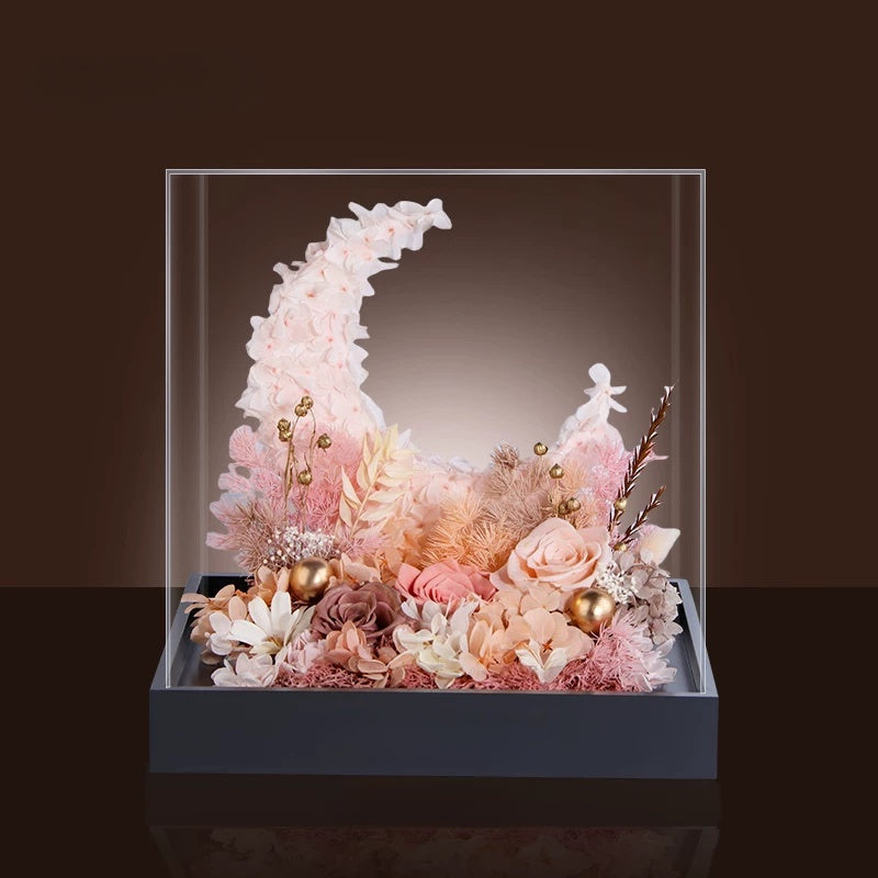 blush preserved flower moon arrangement with roses and hydrangea in acrylic cover, elegant floral decor