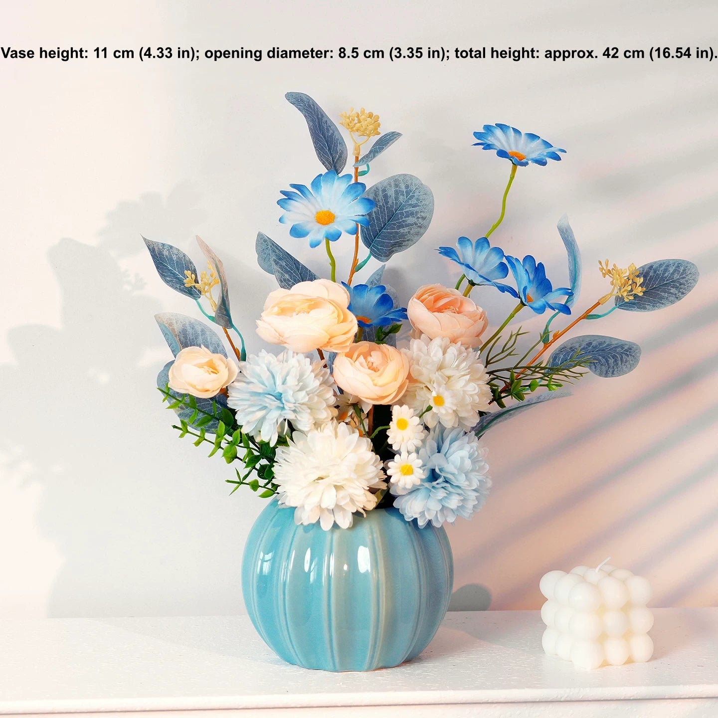 Nordic minimalist artificial flower arrangement in blue vase for tabletop home decor
