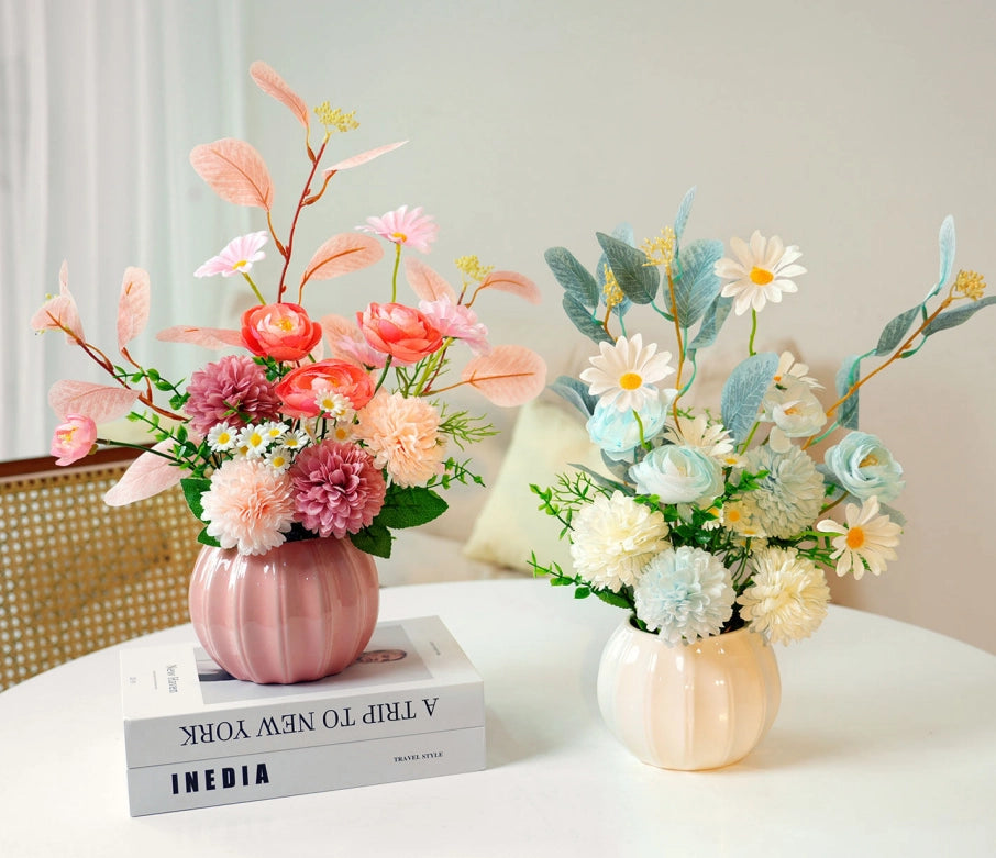 Pastel artificial flower arrangements in ceramic vases for home decor