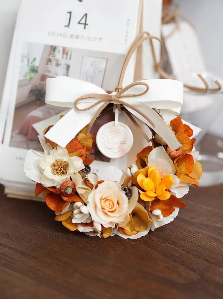 Orange preserved flower wreath with aroma stone diffuser for autumn home decor