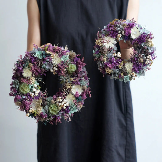 Decorative purple preserved flower wreath for front door, wall display, or dining table centerpiece.
