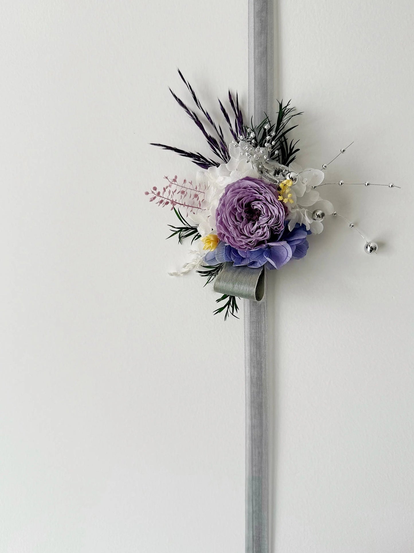 Purple preserved flower wrist corsage with rose and ribbon for bridal accessory