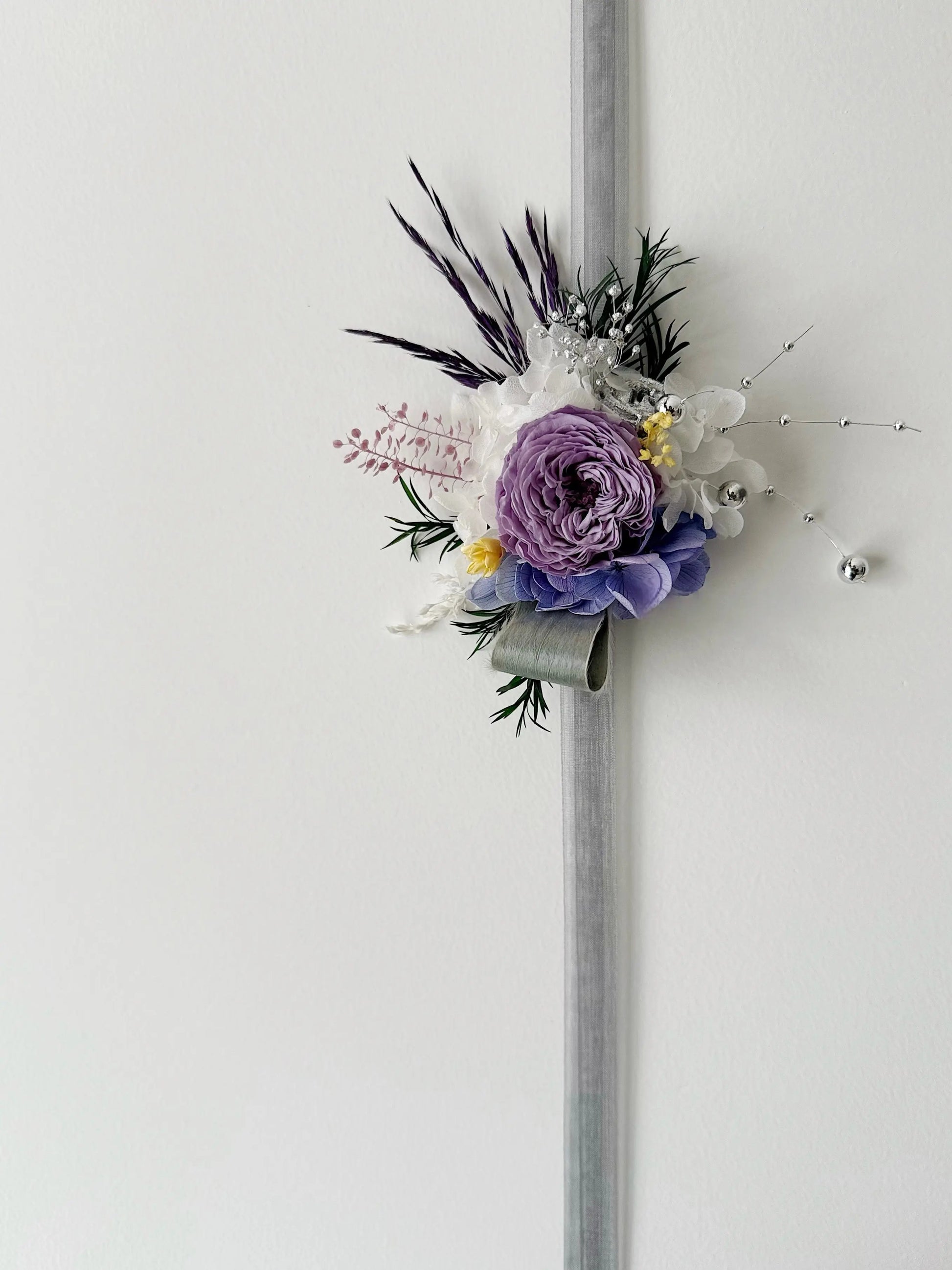Purple preserved flower wrist corsage with rose and ribbon for bridal accessory