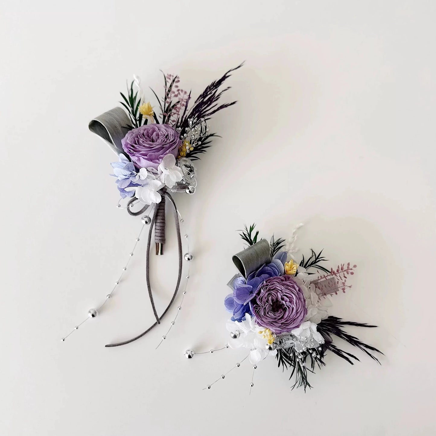 Purple wedding corsage and boutonniere set with preserved rose and hydrangea