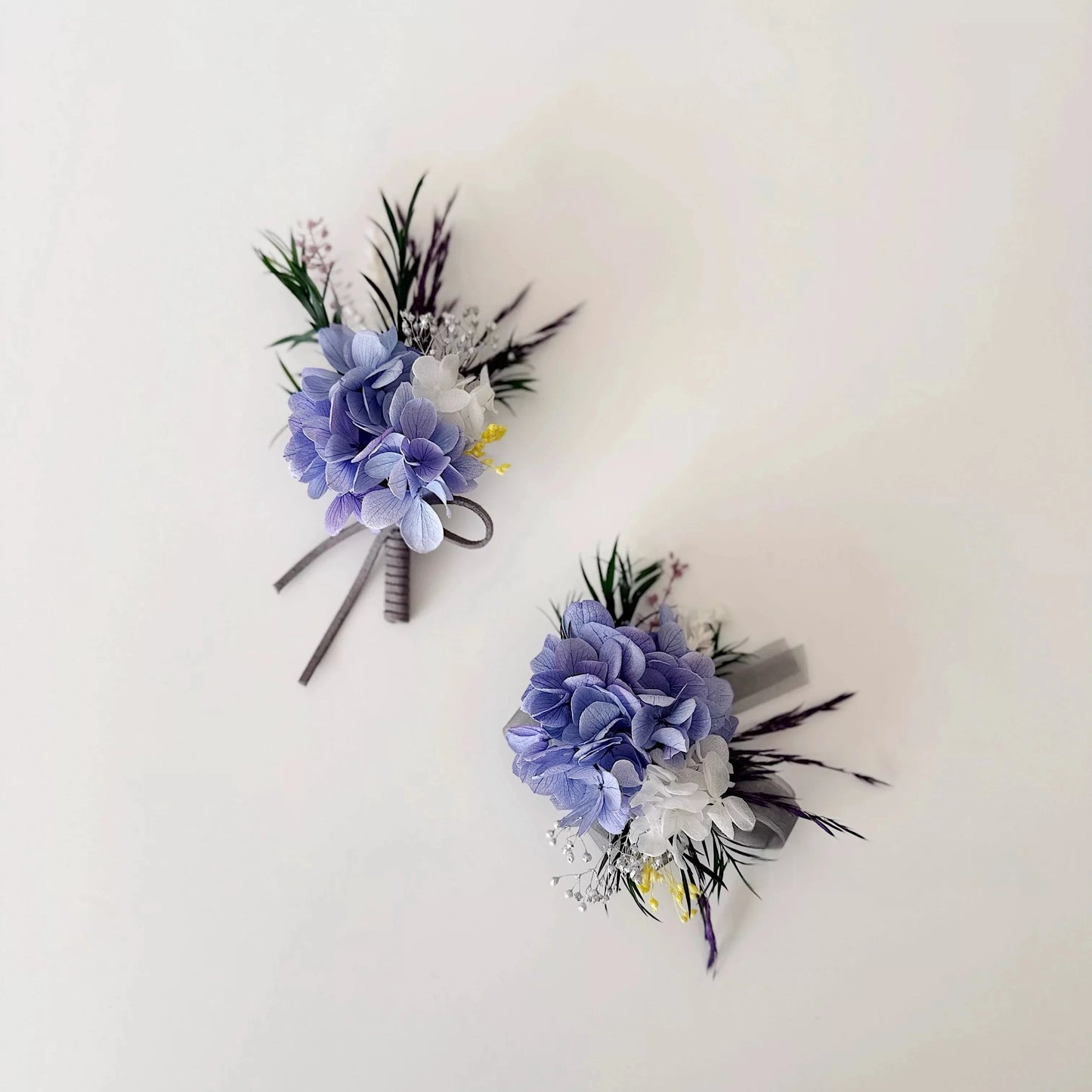Purple wedding corsage boutonniere set with preserved flowers for bridal party