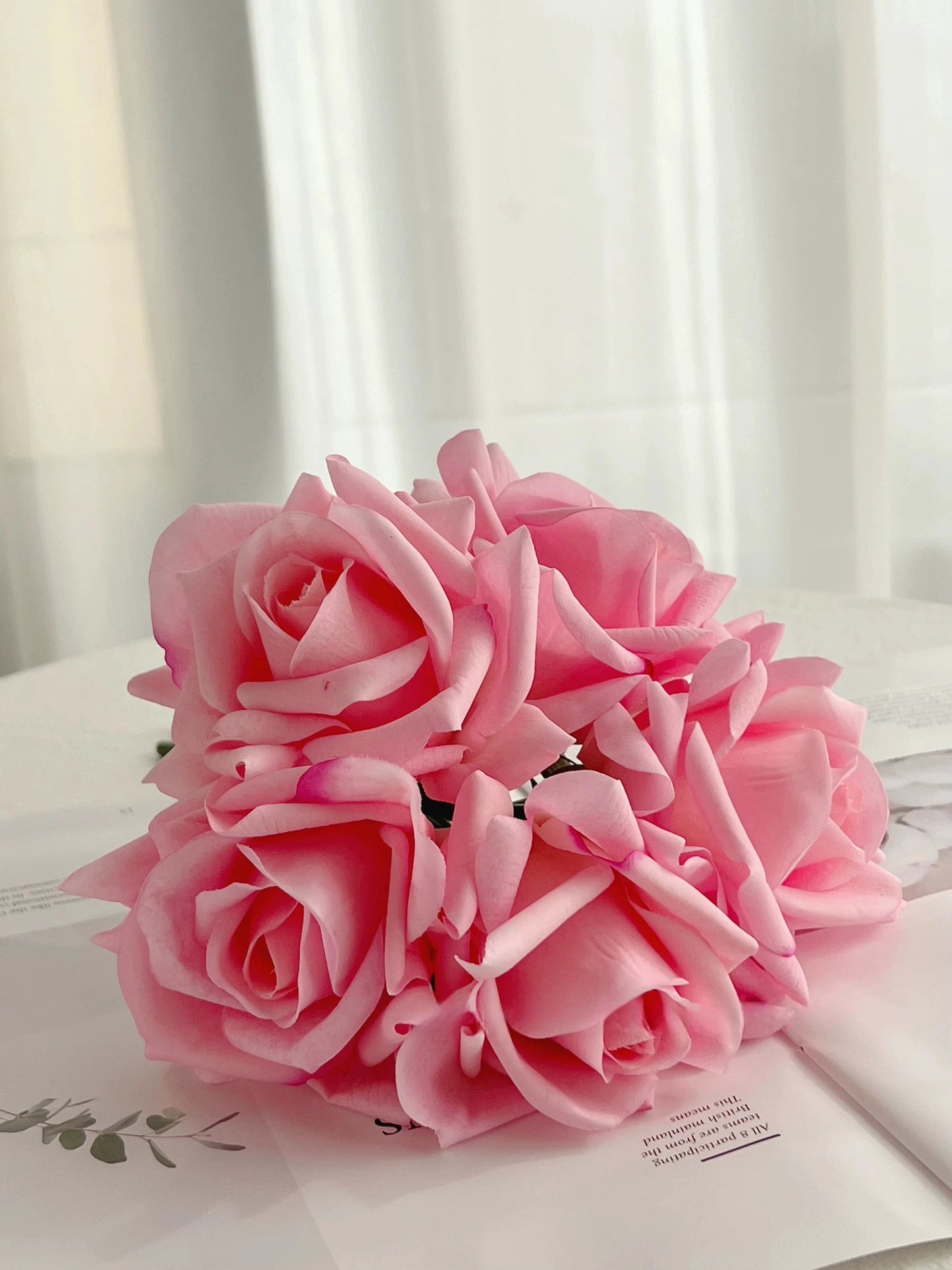 Deep pink realistic faux rose bouquet for wedding and event decor